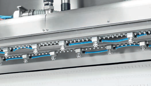 A close up of a Nozzle Dosing machine.