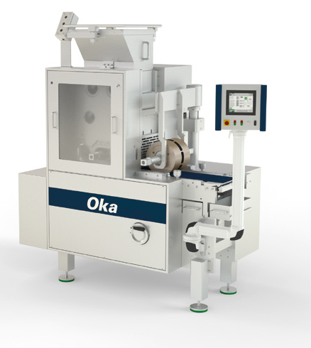 Industrial bar moulder machine, branded 'Oka'.