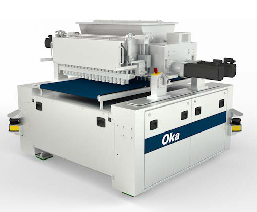 Industrial cookie capper machine with 'Oka' branding.