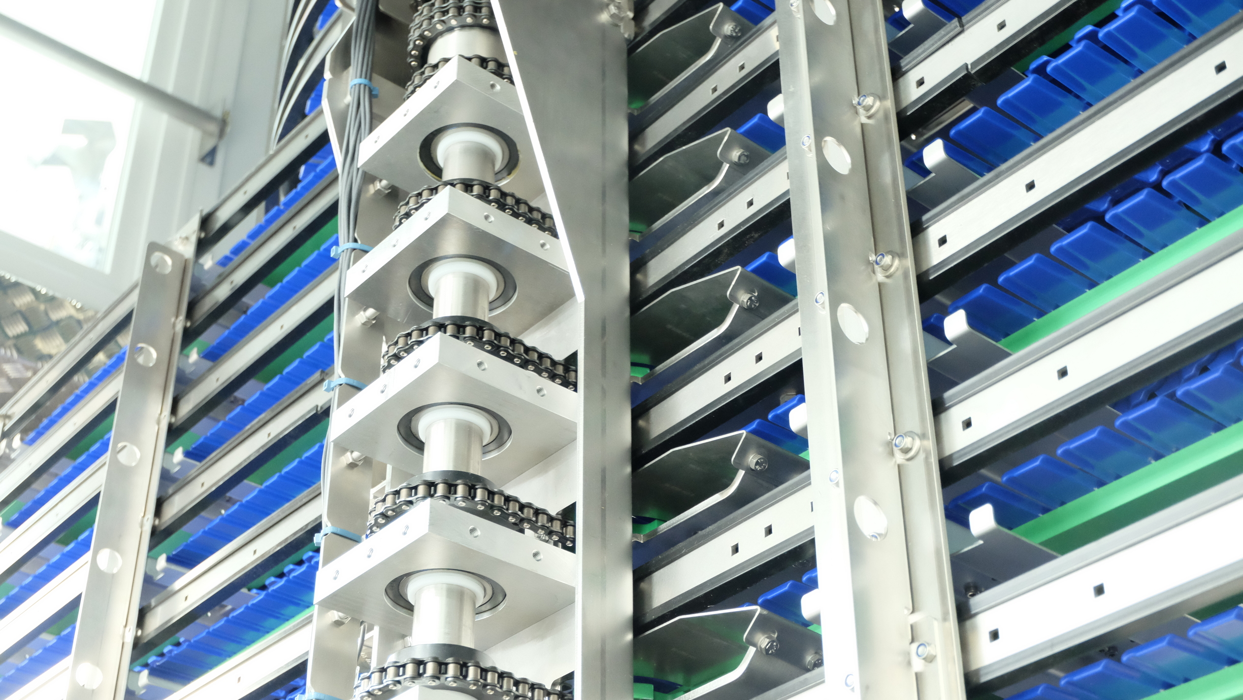 Close up of a large cooling spiral in an industrial food processing facility. 