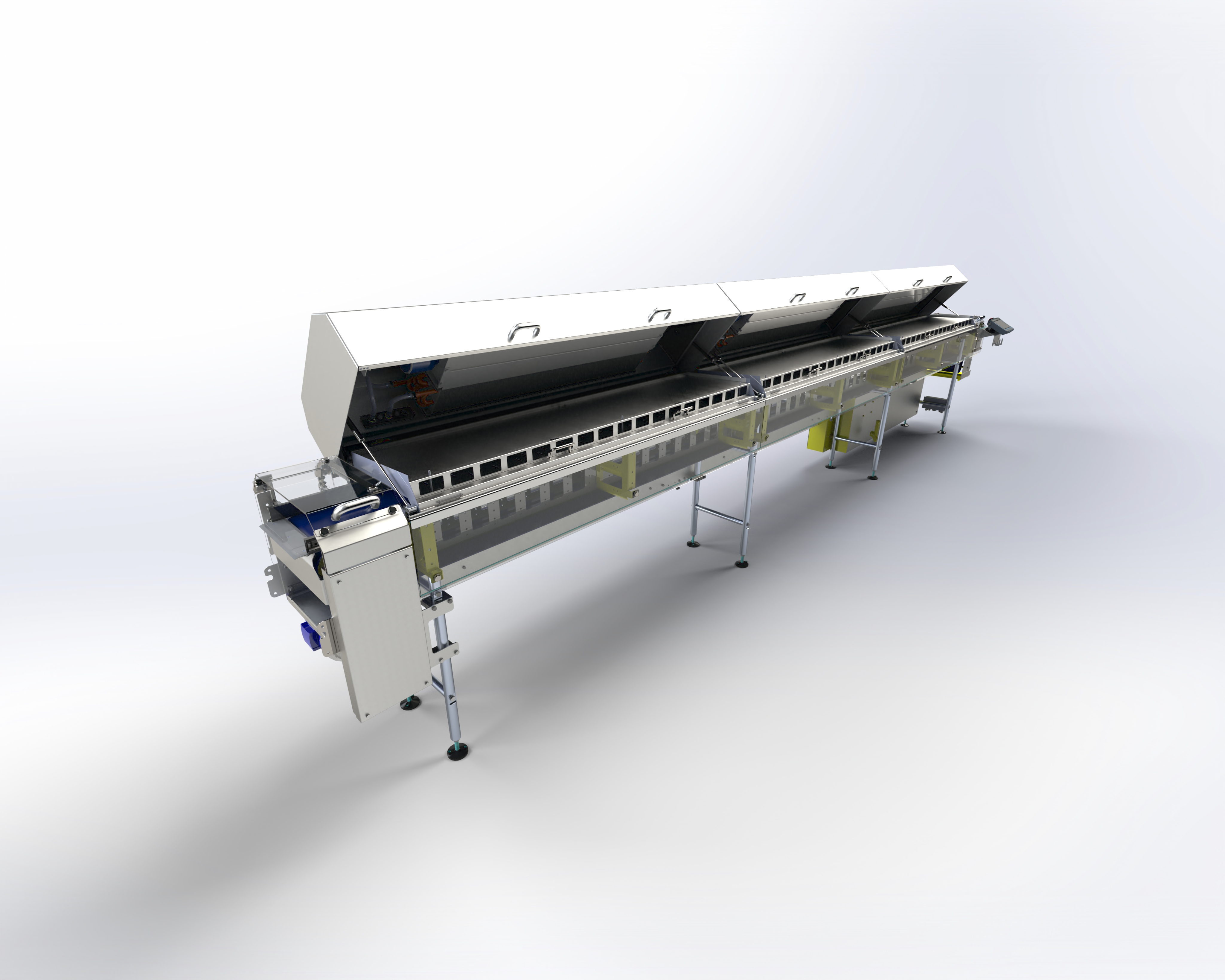 Long industrial cooling tunnel conveyor with open covers.