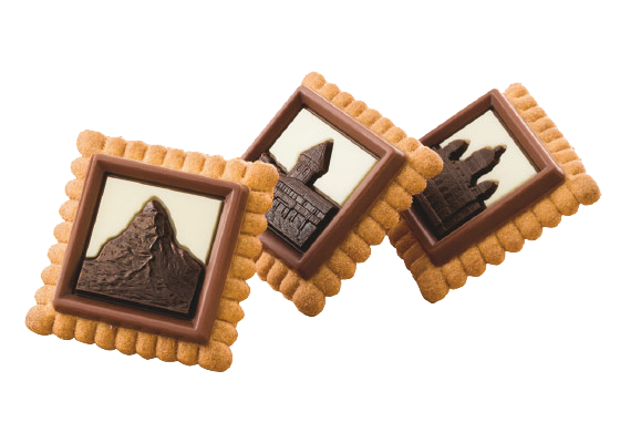 Biscuits designed with chocolate mountains and buildings.