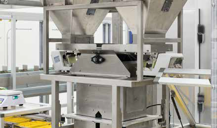 Chocolate mixing machine in a factory setting.