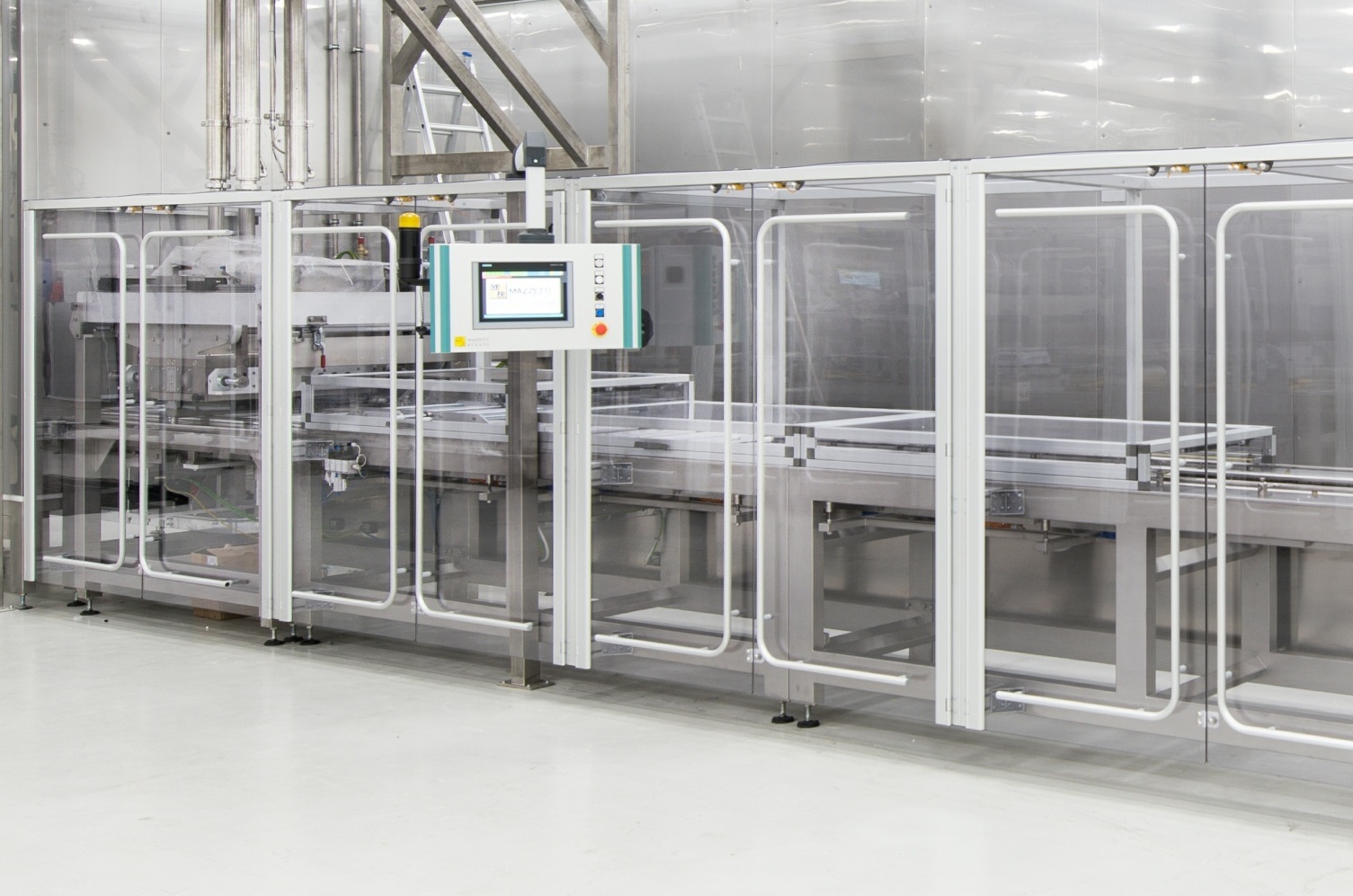 Image of an industrial moulding line in factory setting.