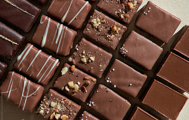 Assortment of decorated square chocolate bars.