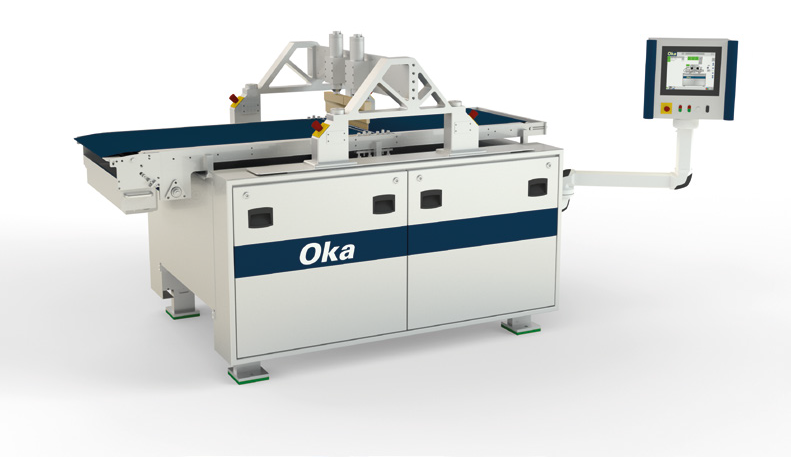 Wide shot of an industrial ultrasonic food cutting system.