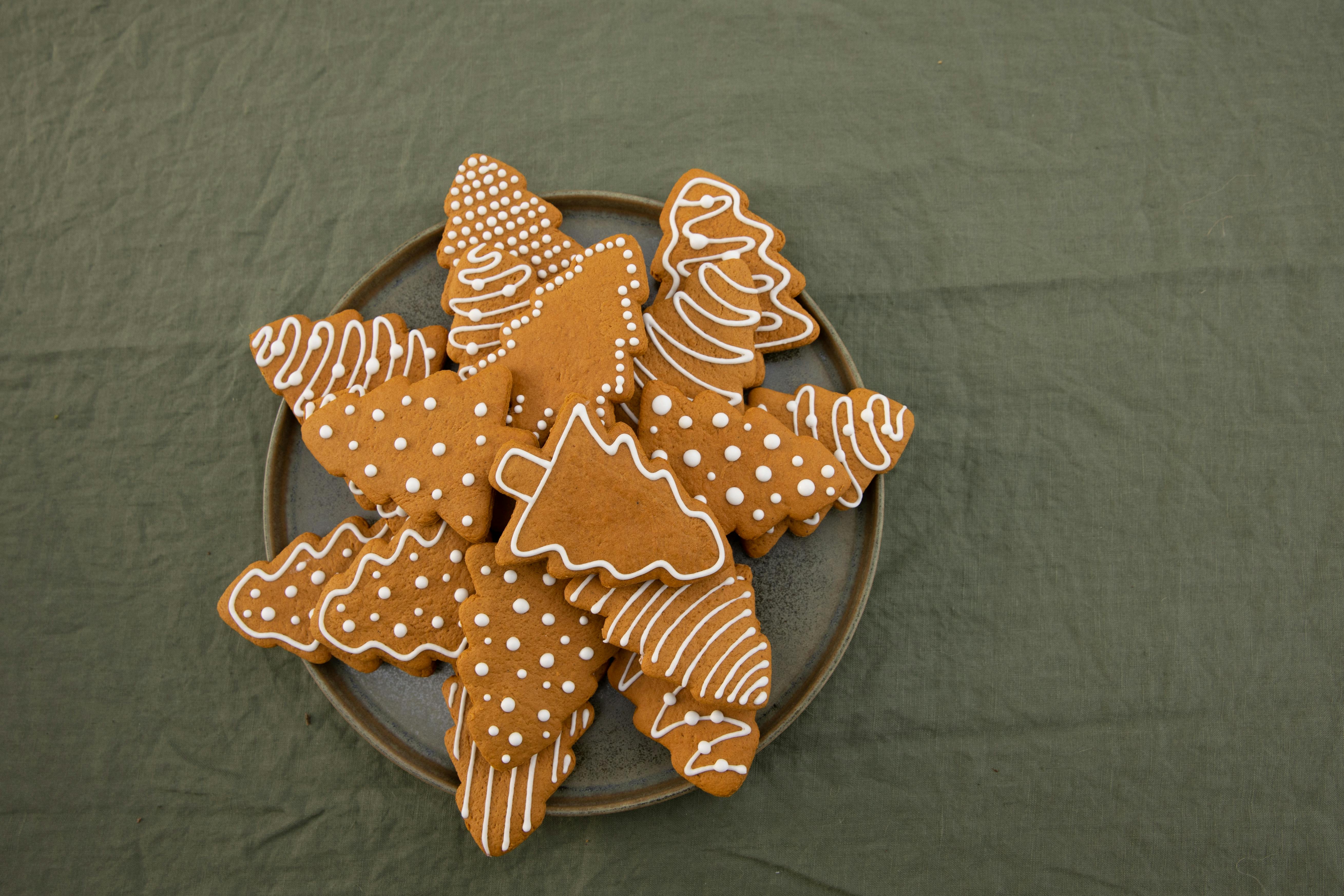 Decorated Christmas-tree gingerbread cookies.
