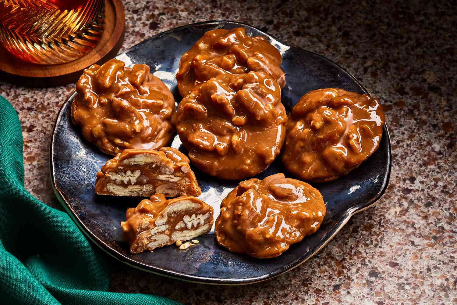 Glossy image of pralines on a plate.
